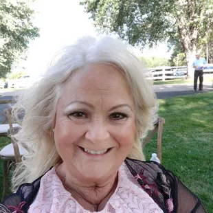 a woman in a pink scarf