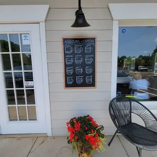 a blackboard on the side of a building