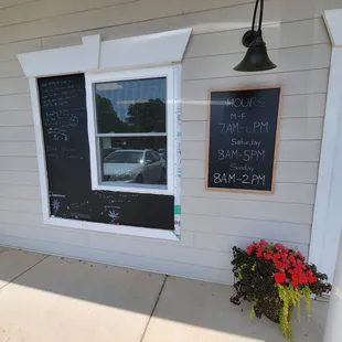 a chalkboard and window
