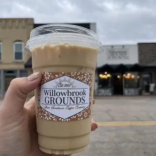 Latte in front of shop