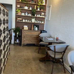 Some of the inside seating. They also have outside seating and a few chairs at the window.