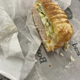 Mesquite Turkey sandwich with Vermont cheddar, banana peppers and Mayo on a croissant... pressed