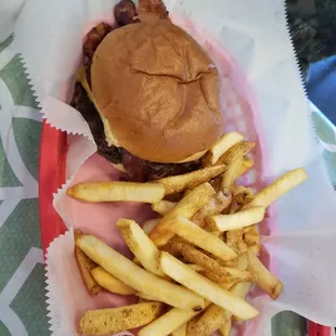 Bacon cheeseburger with mustard and classic fries