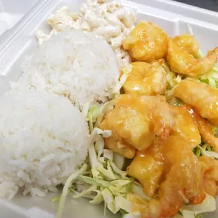 a close up of a meal in a styrofoam container