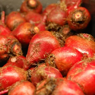 a pile of pomegranates
