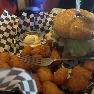 Wicked Willy burger (spicy and delicious) with a side of mayo and the crispiest tots!