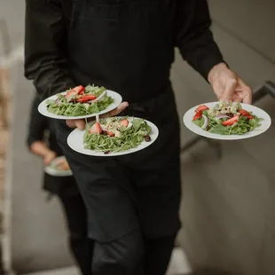 Arugula and butter lettuce salad w/ avocado, strawberries, cranberries, red onion, toasted pine nuts, and honey-balsamic vinaigrette