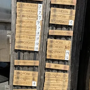 a number of wooden signs