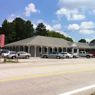 cars parked in front of the restaurant