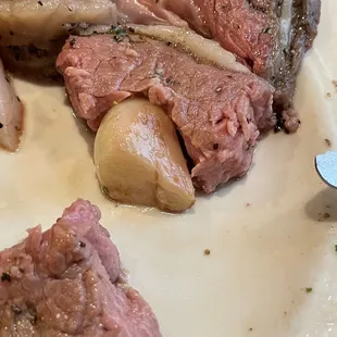 Garlic clove in the prime rib