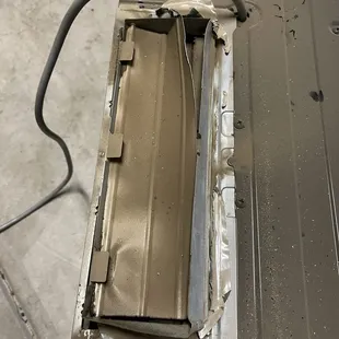 Top of microwave, vent flap shut.