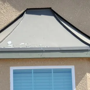 After 2 years, the paint on our awning has peeled.