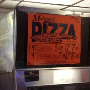 a sign for a pizza restaurant