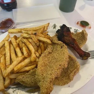 REAL catfish, fries and smoked chicken.  The green sauce was delicious with a touch of heat.  The sauce should be bottled and sold!