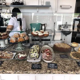 a display of cakes and pastries
