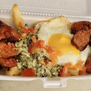 Chori Fries - fries topped with cheesy spinach, egg, house Chorizo &amp; tomato