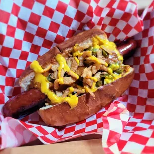 Texan dog - beef frank, chili, pickled jalapeno, crispy onion, mustard