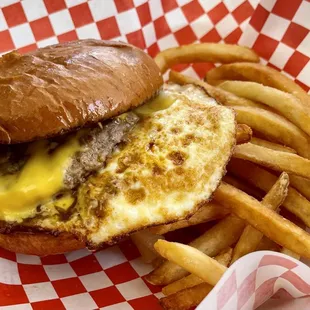 Eggman Sando - house original sausage patty, two medium eggs, cheese on a brioche bun