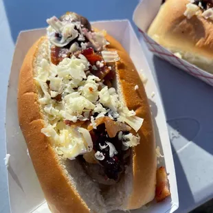 Drunken Boar Sausage (made with port wine) with Funky Town topping and Frog sauce.
