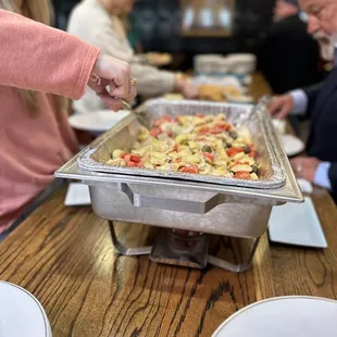 a woman serving food