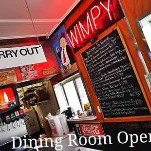 a restaurant with menus on the wall
