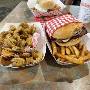 two burgers and onion rings