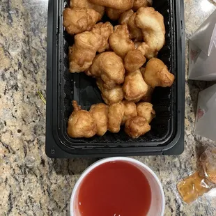 Sweet and sour chicken      No vegetables and sauce without sweet nor sour  But cost 11 bucks