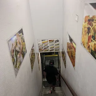 Entrance with lots of photos of the food to give you an idea