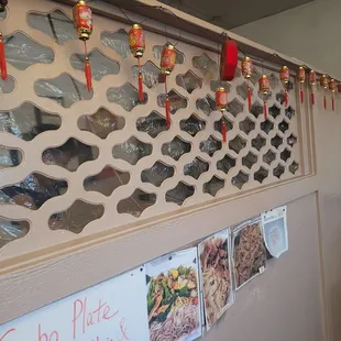 a wall with chinese food on it