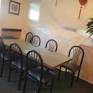 a table and chairs in a restaurant