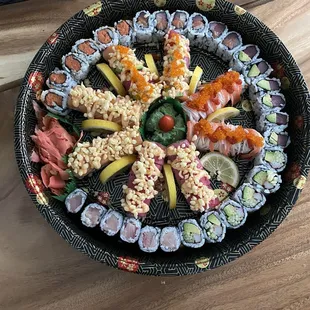 tray of assorted sushi rolls. Love the care they put into their food- even the take out!