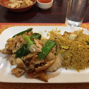 Chicken vegetables and fried rice.