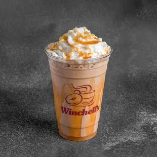 a cup of coffee with whipped cream