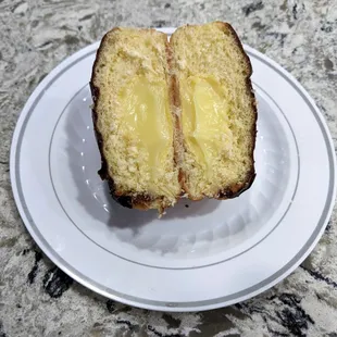 1/12/23 Filled Donut with Vanilla Cream and Chocolate Icing