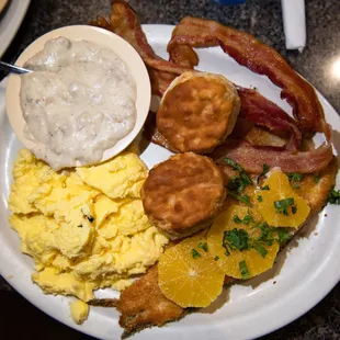 Trout with eggs and added bacon, biscuits and gravy