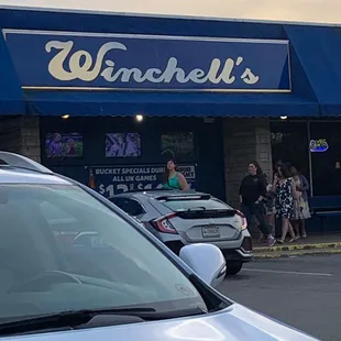 cars parked in front of the store