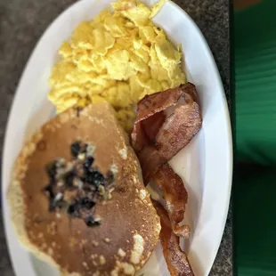 Bacon scrambled eggs and blueberry chocolate chip pancake