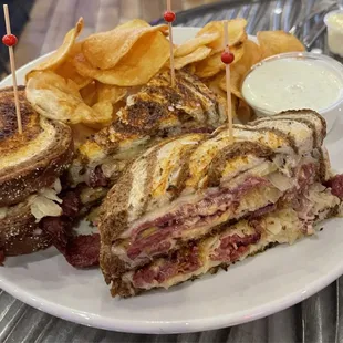 Triple Decker Rueben Sandwich with Housemade Chips.