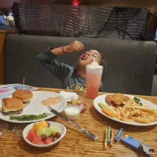Mini cheeseburgers. Chicken fingers. With 1 side option. Ask for the kids&apos; fizz (shirley temple w whipped cream &amp; a cherry on top)