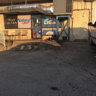 a car parked in front of a building