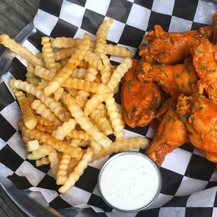 Buffalo Wings - Crispy jumbo wings tossed in classic Frank&apos;s Red Hot buffalo wing sauce in all its glory.