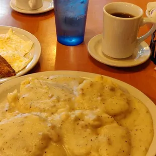 Proper country biscuits &amp; gravy - fresh buttermilk biscuits, sausage gravy with ground black pepper - it was fantastic!