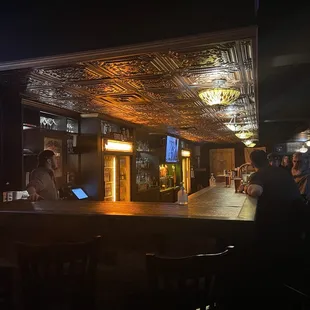 people sitting at the bar