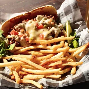 a plate of fries and a sandwich