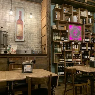 Another seating area with tons of wine options.