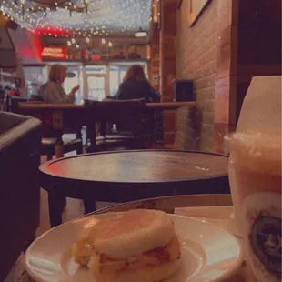 Breakfast sandwich and cold drink