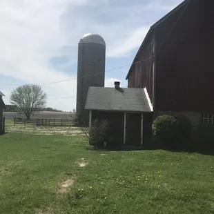 a barn and silo