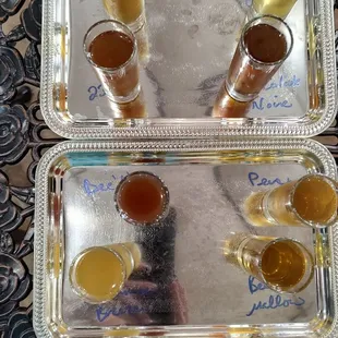 two trays of beer on a table