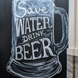 a chalk drawing of a beer mug