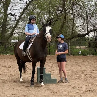 Peyton and Scooter being coached by Madison